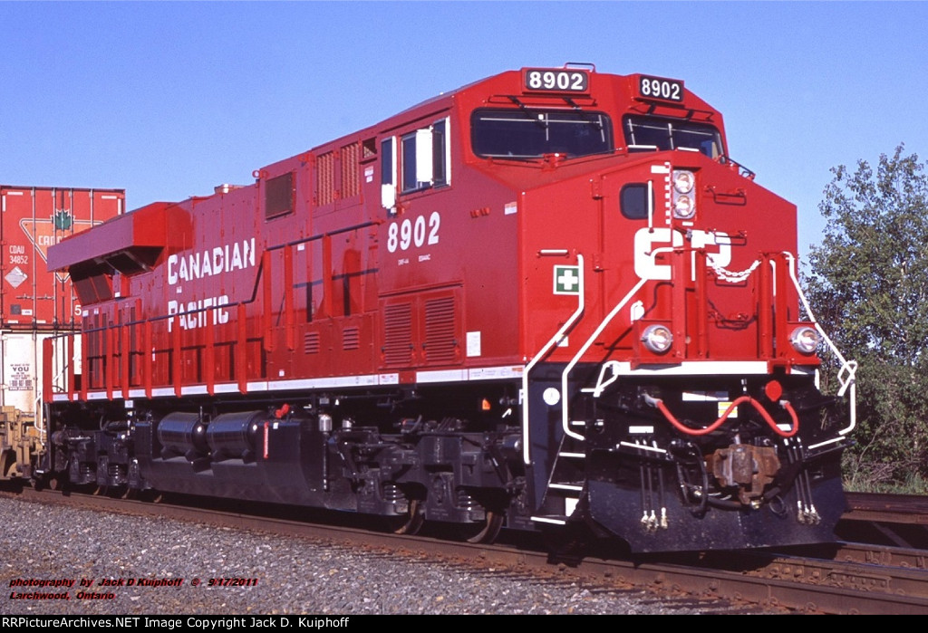 CP, Canadian Pacific Railroad 8902 ES44AC, leads a eastbound 110, past the signal at mp 93.8 Cartier sub,  Larchwood, Ontario. September 17, 2011 